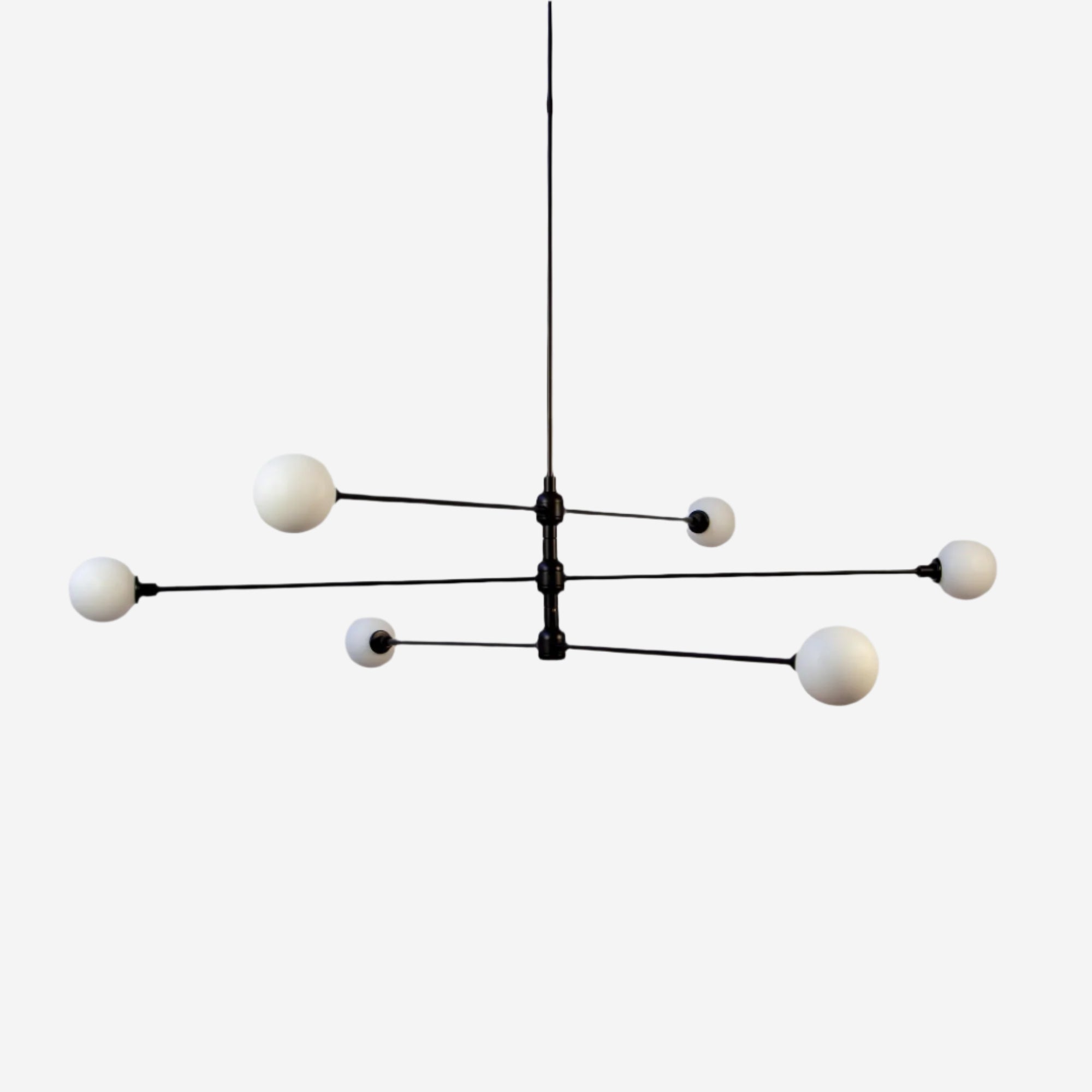 Glass Chandeliers That Keep Bedrooms Light and Quiet